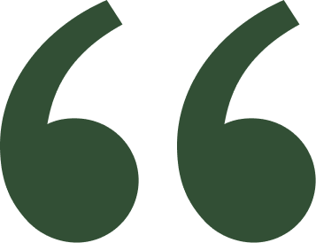 Green quotation marks on black background