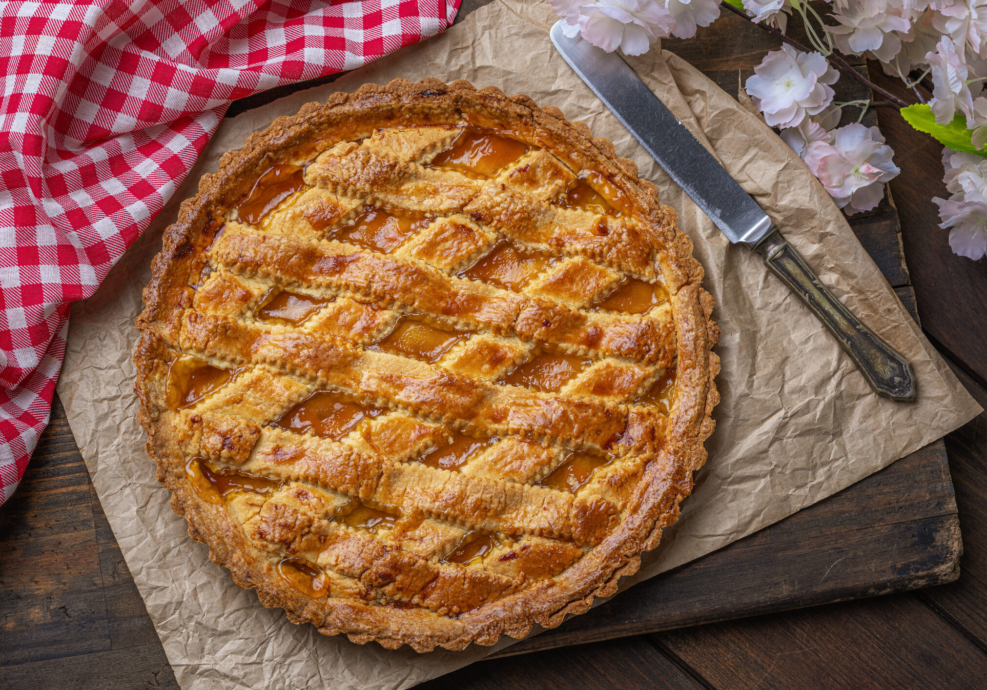 Apricot sweet pie or Italian Crostata. Homemade baked sweet food or dessert